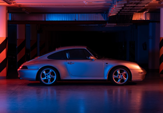 Garage floor with a high-end car on it