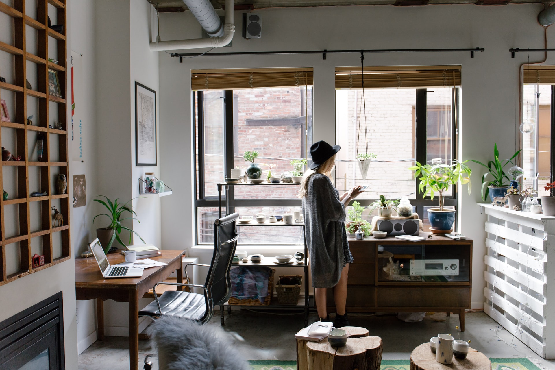 A women trying to maximize space in her new NYC studio apartment