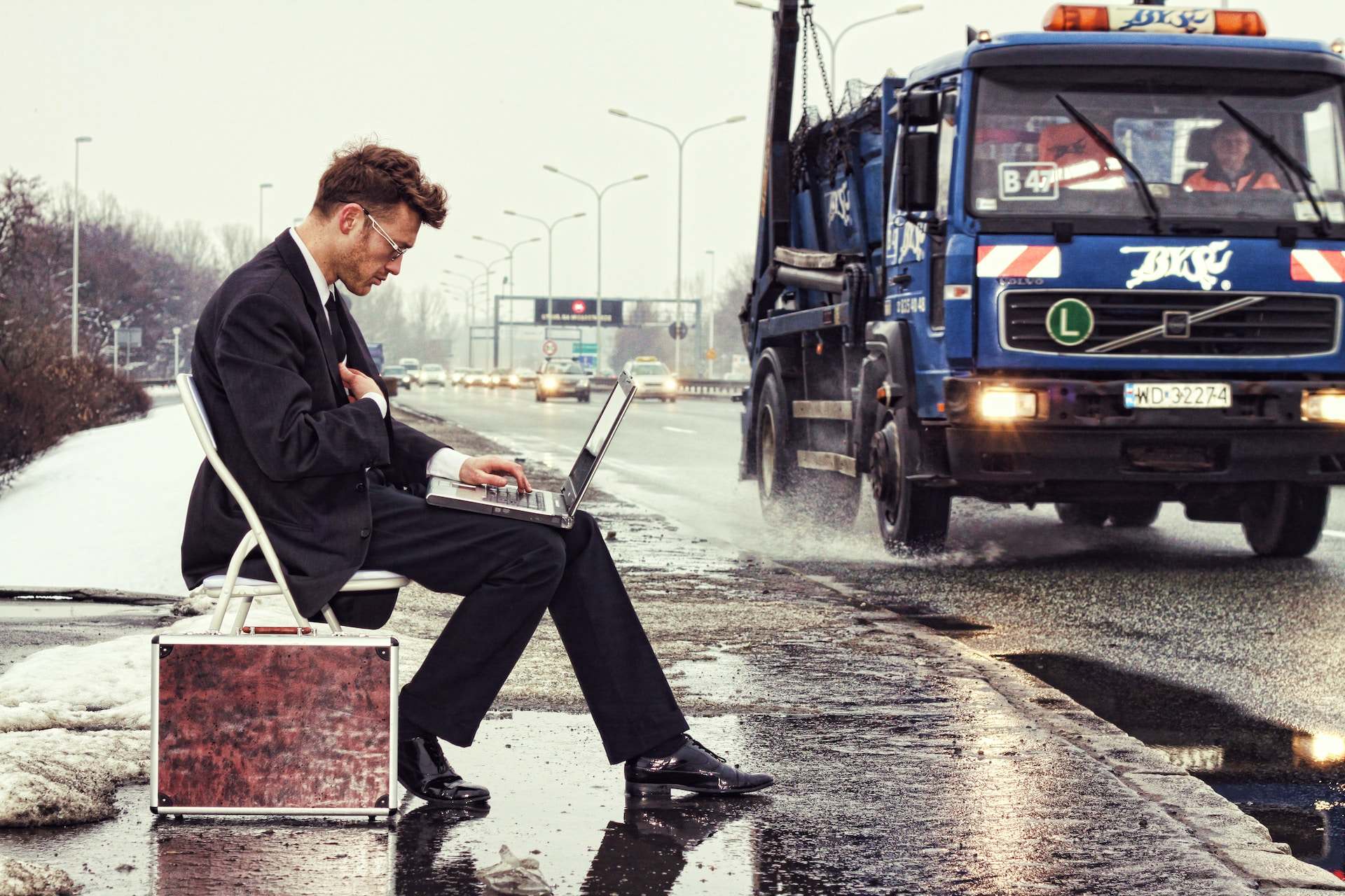 A man sitting on a park bench