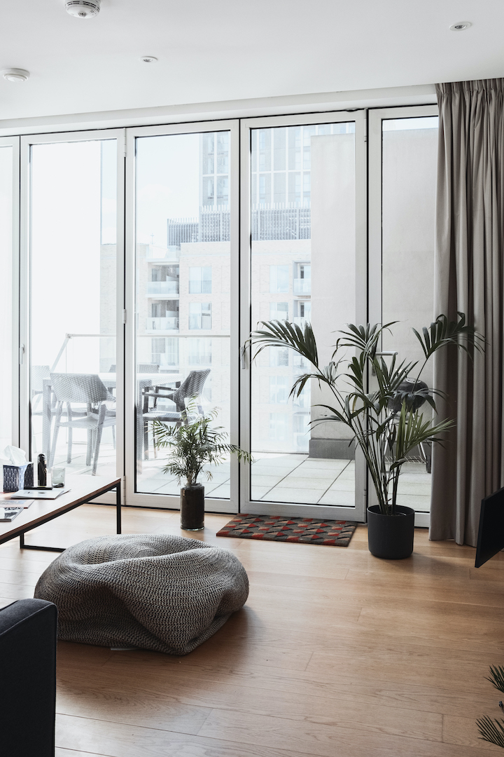 living room with Sliding Patio Doors facing the outdoors