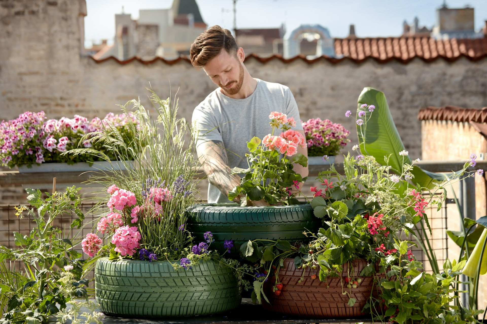 A man tiding up his garden