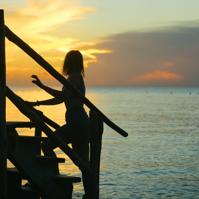 Women walking up stairs clueless in Cozumel