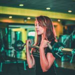 Woman in a gym Weight Maintenance during the Holidays