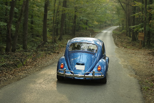 VW Bug taking a road trip with car insurance.