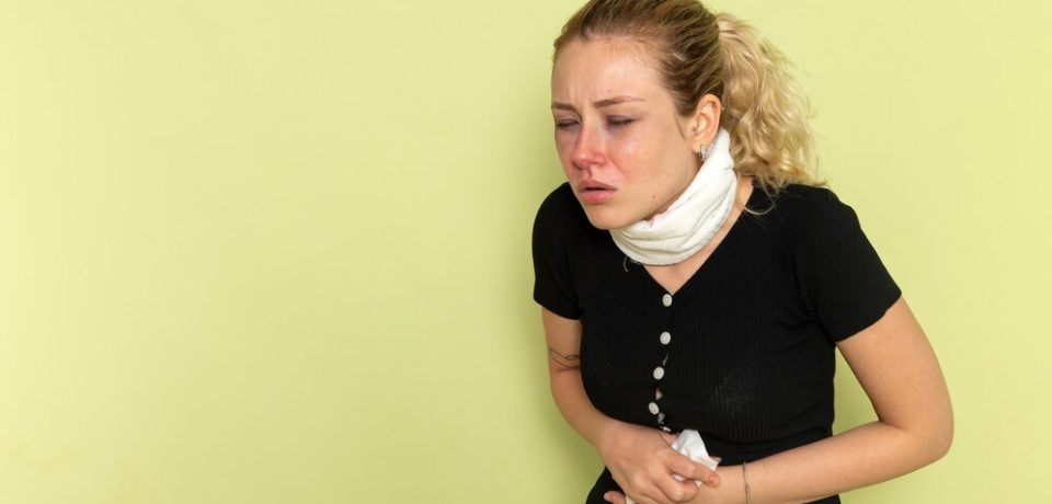 front-view-young-female-with-white-towel-around-her-throat-feeling-very-sick-ill-light-green-desk-illness-sickness-female-color-health_140725-65589